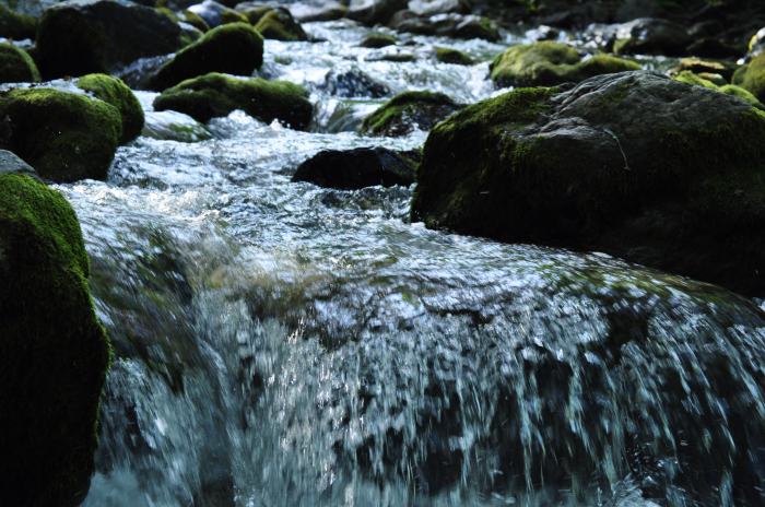 Water flows by gravity from one lake to another